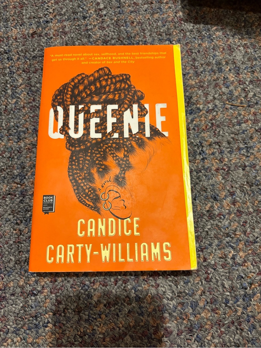 'Queenie' Orange Paperback Book